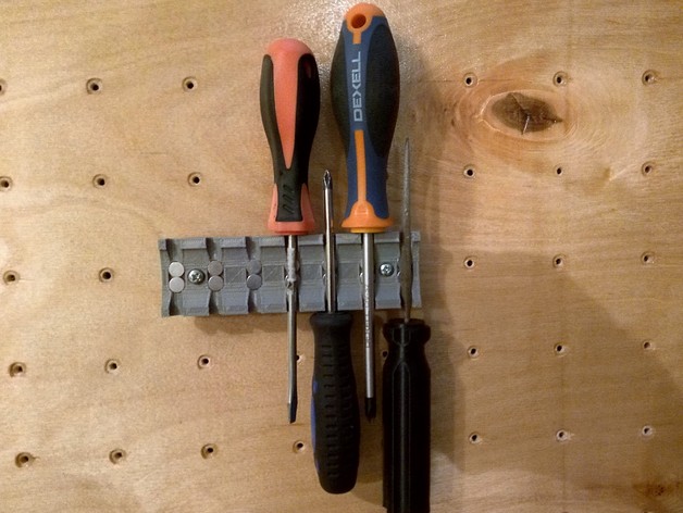 Peg board screwdrivers holder