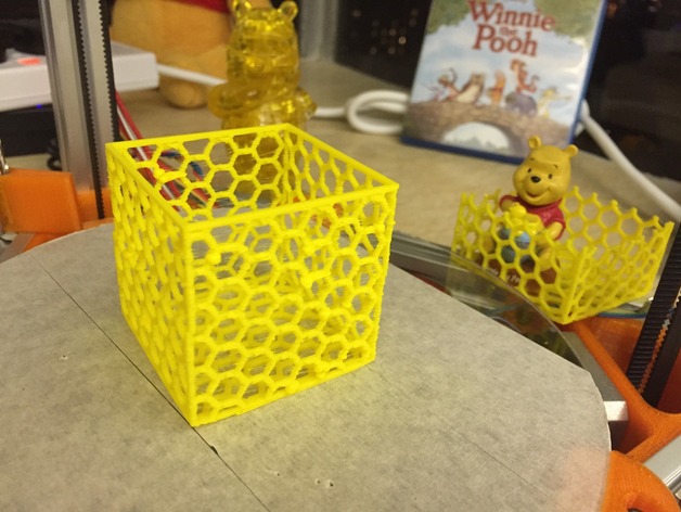 Box with honeycomb hole pattern