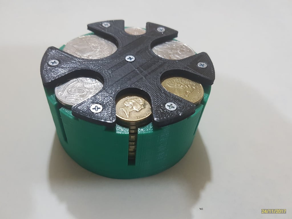 Coin holder with spring lifts for Australian coins