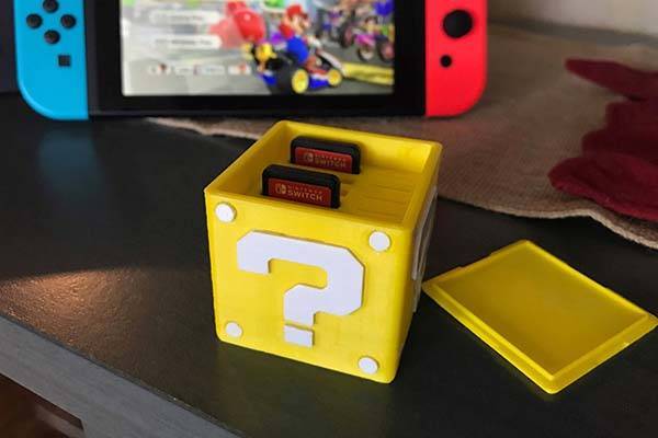 Nintendo Switch game card holder with question mark and Nintendo Switch logo