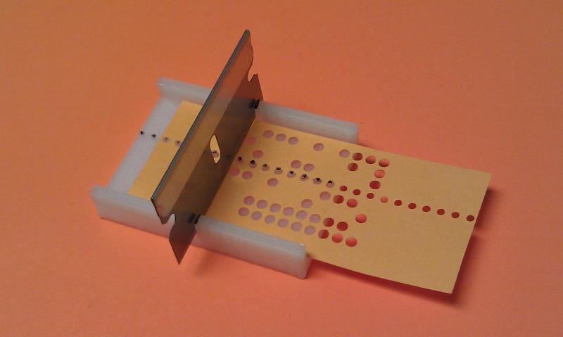 Teletype paper tape splicing and alignment guide jig