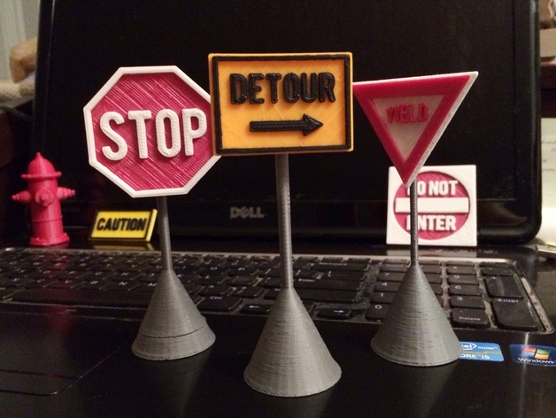 Road Signs for your desk (on a post), lapel (pins), or fridge (magnets)