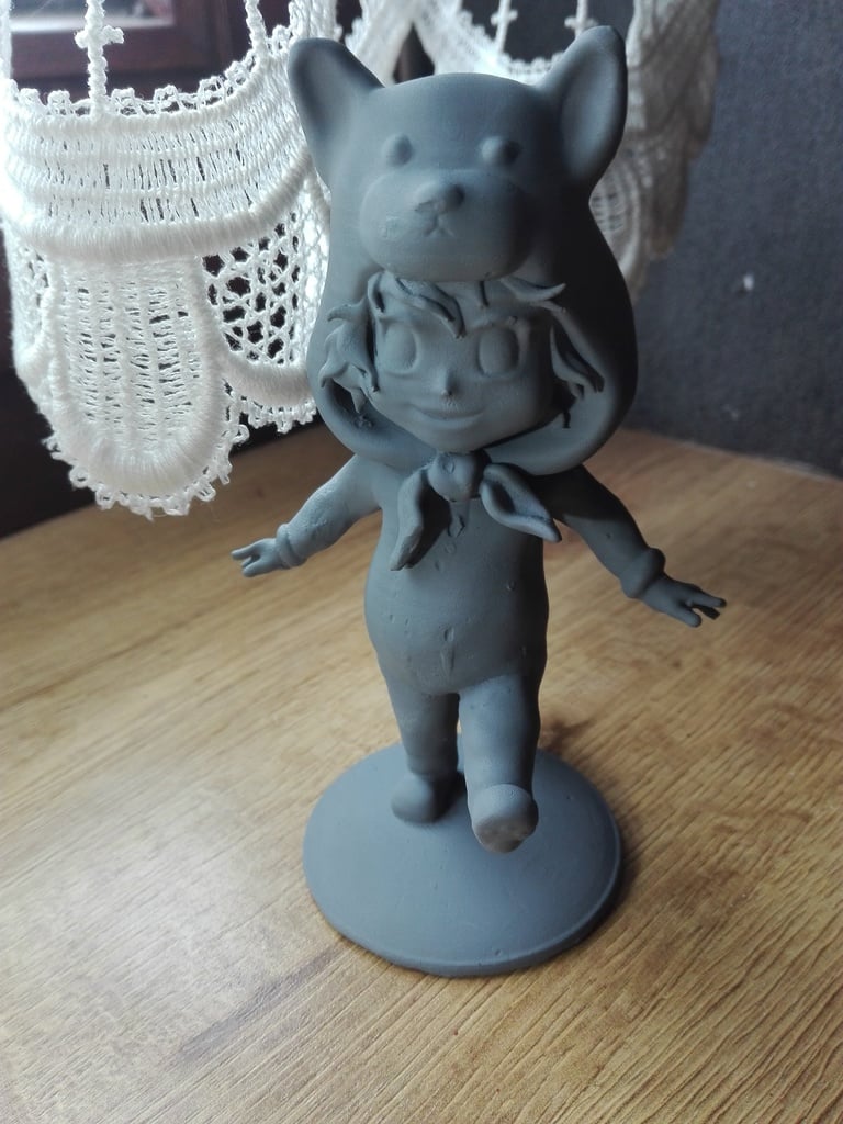 Racoon girl figurine
