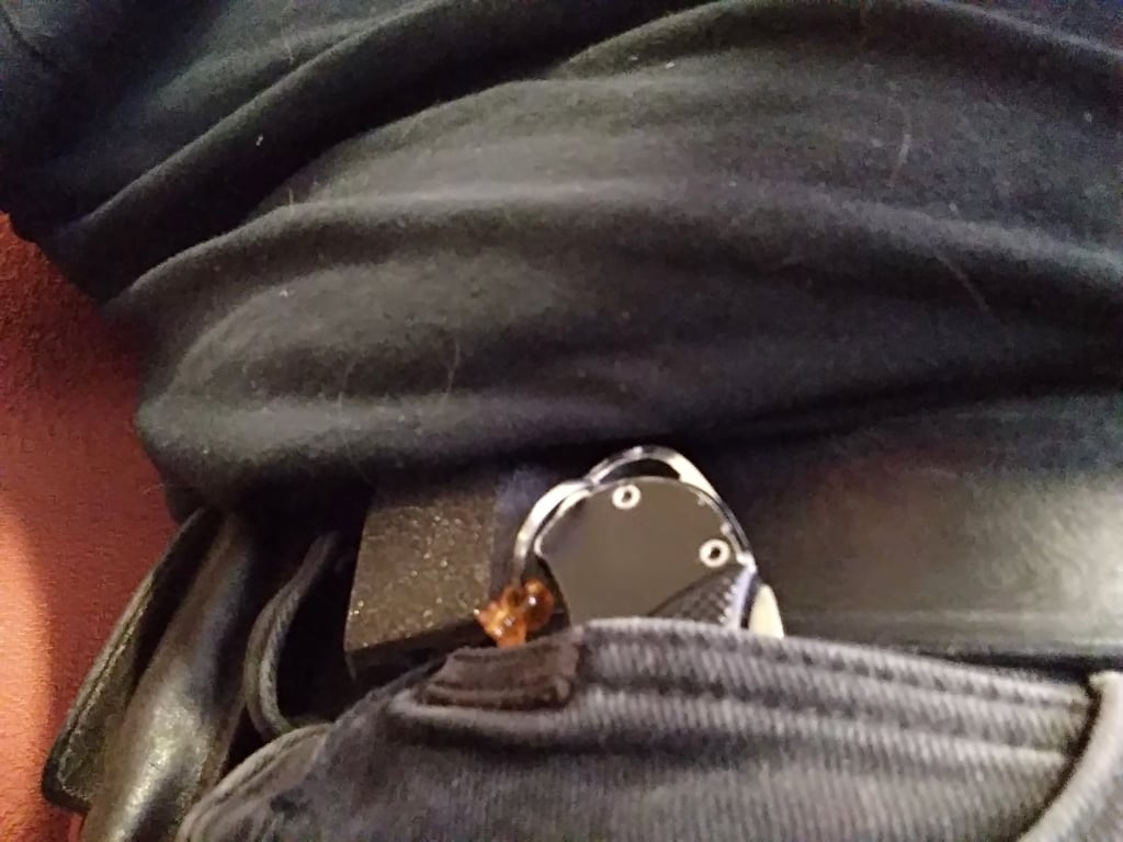 Belt retractable badge holder