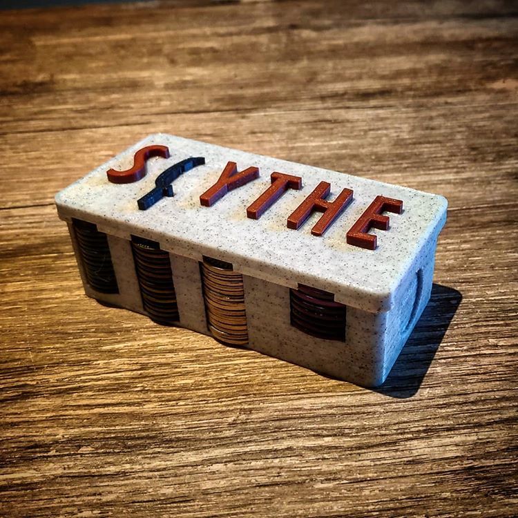 Scythe coin box magnetic clousure