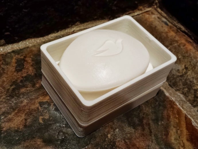 Soap dish with travel lid that doubles as a base