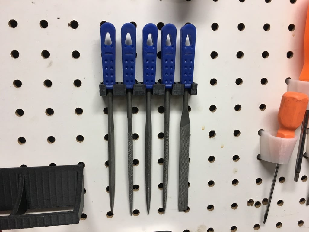 Small hand file set holder for pegboard