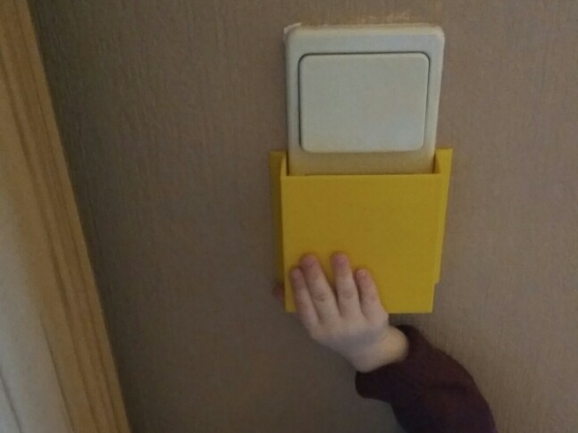 Childproof lightswitch cover