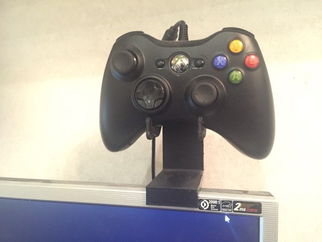 Xbox holder with mount on the monitor