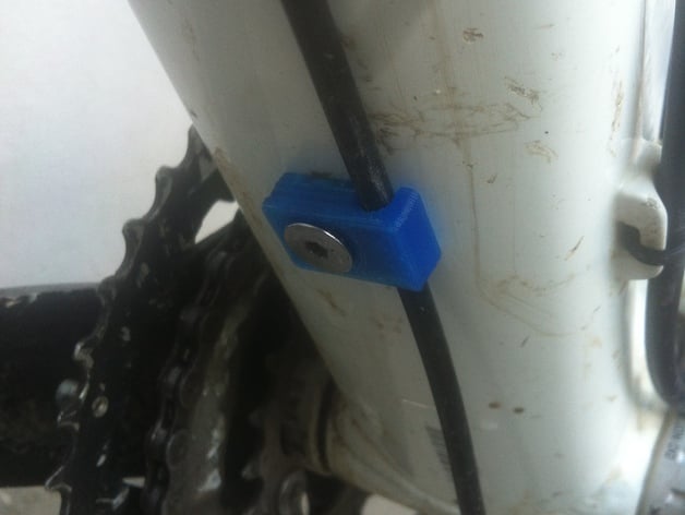 Attachment for cable or hose on a mountain bike