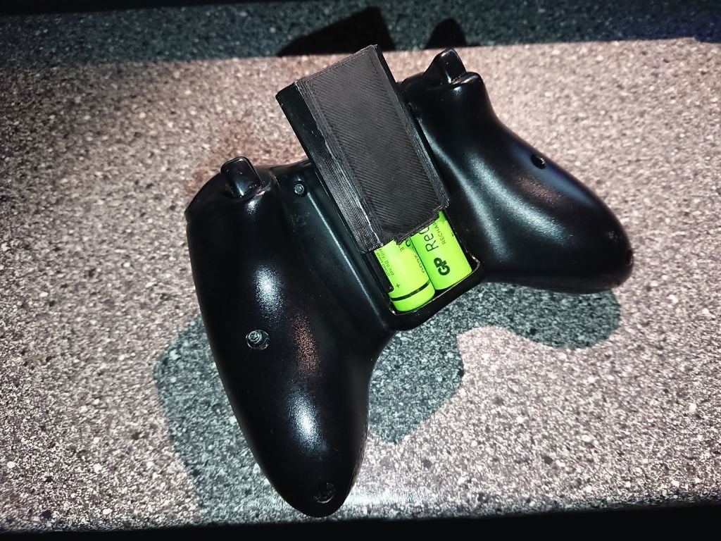 XBox 360 wireless controller battery holder with removable cover