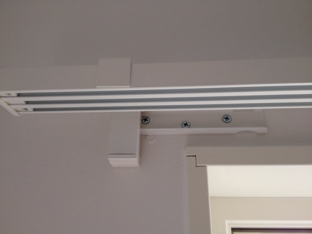 Curtain rail adapter