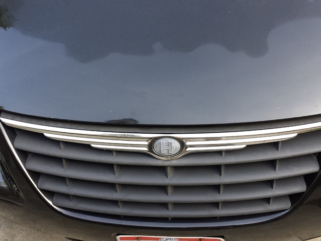 Nameplate for a Chrysler Minivan