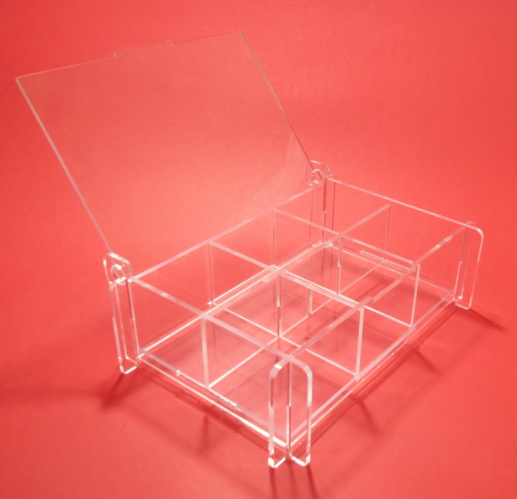 Laser cut storage box with removable partitions made of clear acrylic