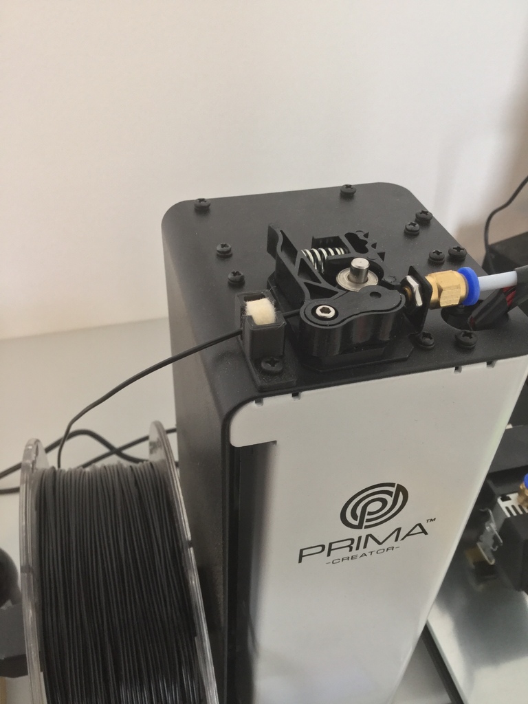 Filament cleaner for the monoprice select mini (using a Dremel polishing wheel)
