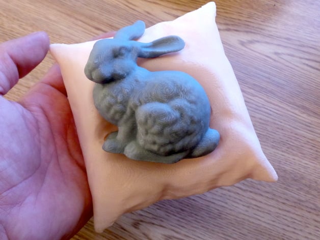 Stanford bunny resting on a pillow
