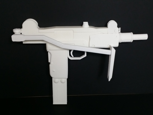 Mini-Uzi submachine gun with shoulder stock opened. (Replica)