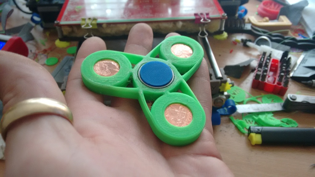 fidget spinner 2p coin printed inside sealed
