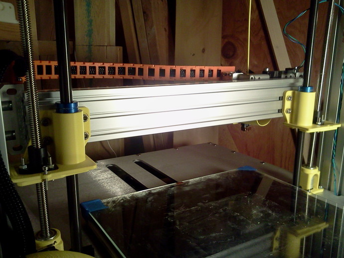 Floating X carriage mount for Trinity Labs Aluminatus 1. De-couples Z axis lift from X-Y variance