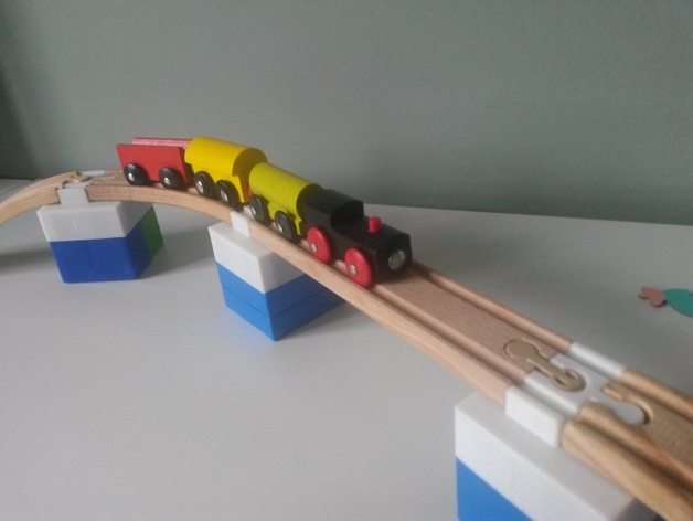Wooden brio train track to Mega Bloks