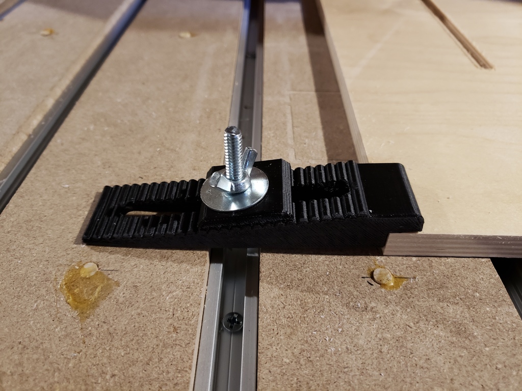 CNC table hold downs