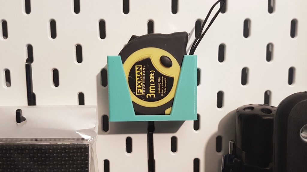 Small tape measure holder for IKEA pegboard