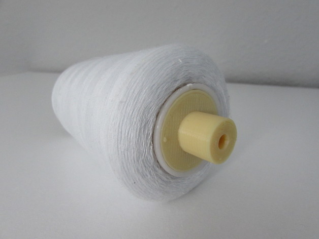 Spool adaptor for domestic sewing machines