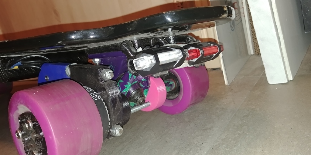 skateboard truck riser with tail light mount
