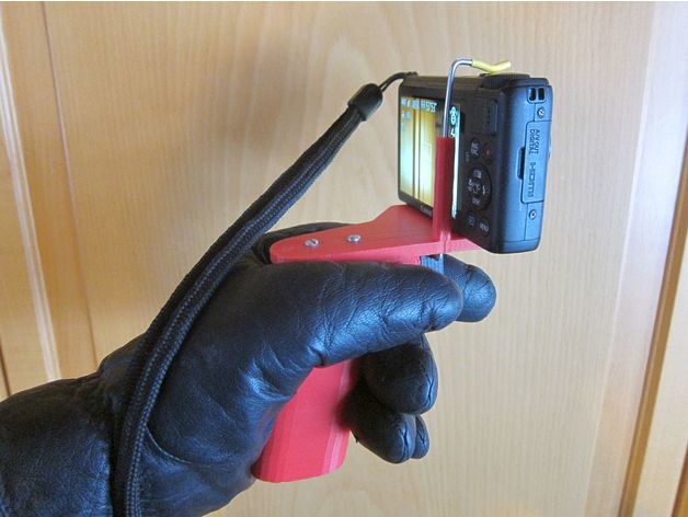 Pistol handle for pocket or action camera