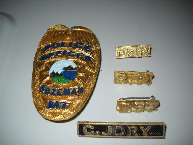 police shield and collar brass