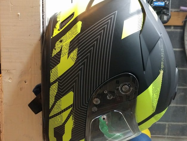 Wall mounted motorcycle helmet holder