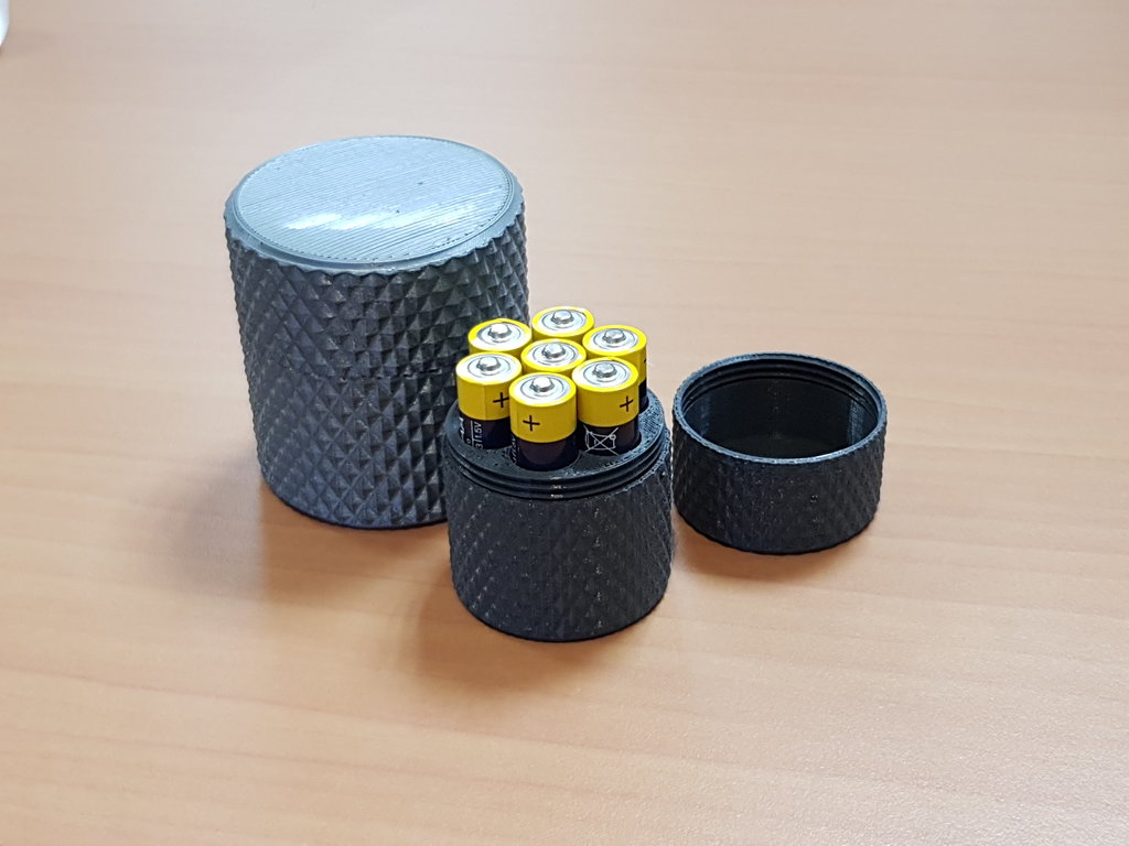 Knurled AAA battery container with screw on lid