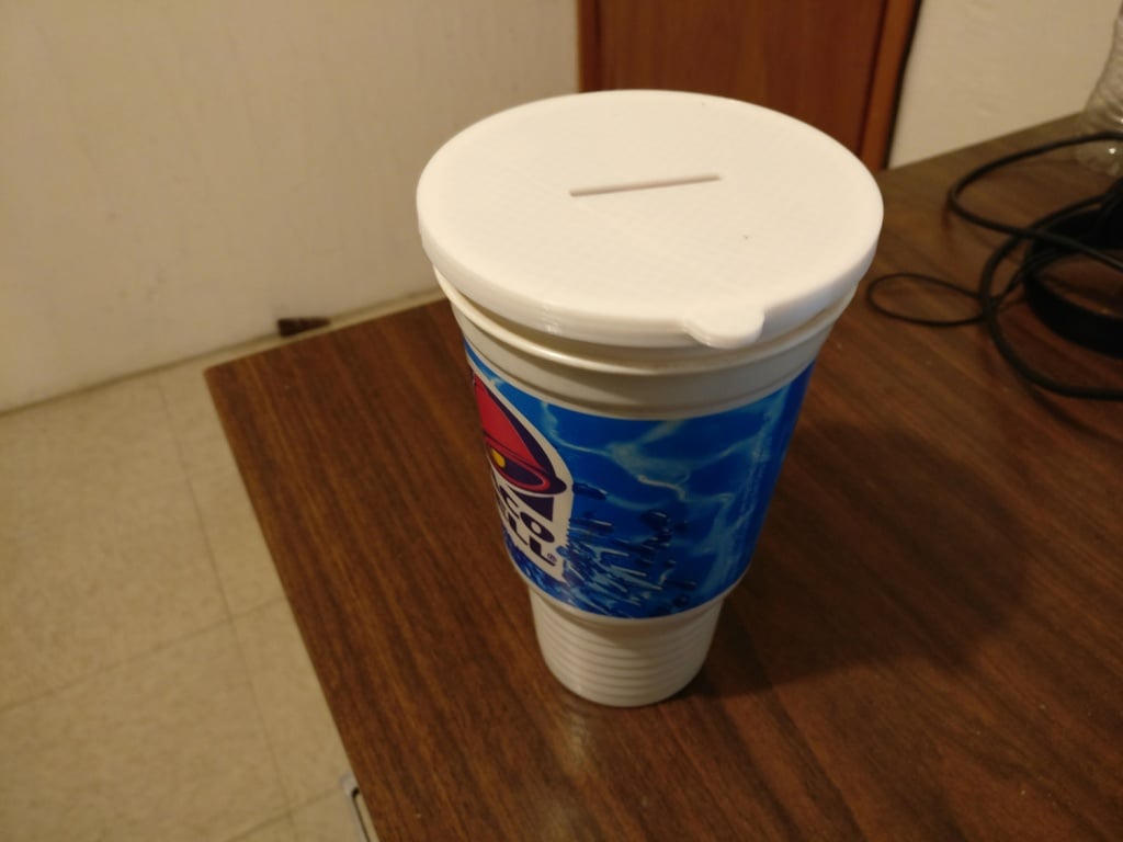 Soft drink cup piggy bank