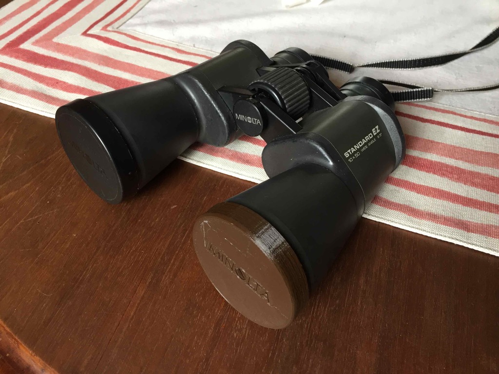 Binoculars 65 mm Minolta lens cap