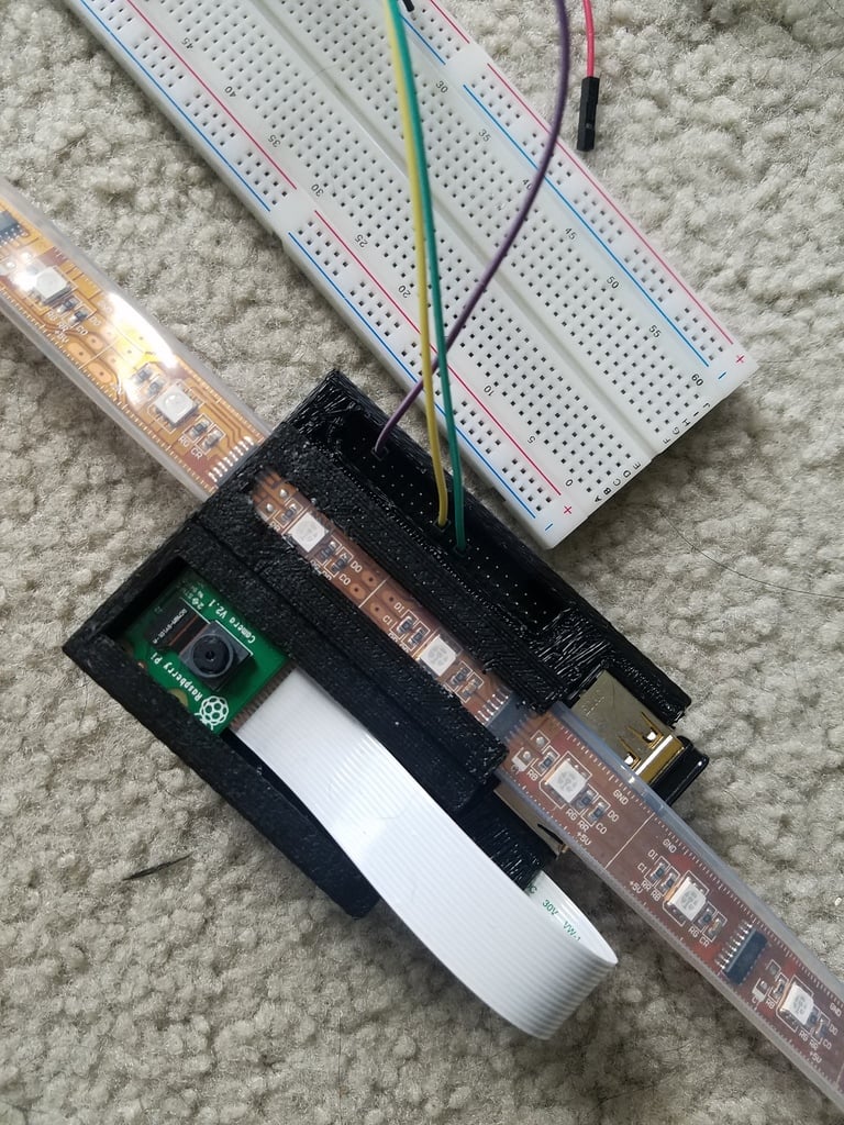Raspberry Pi case w/ LED strip and Camera holders [WIP]