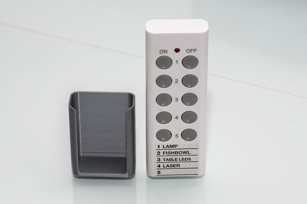 Craddle for wireless light switch remote