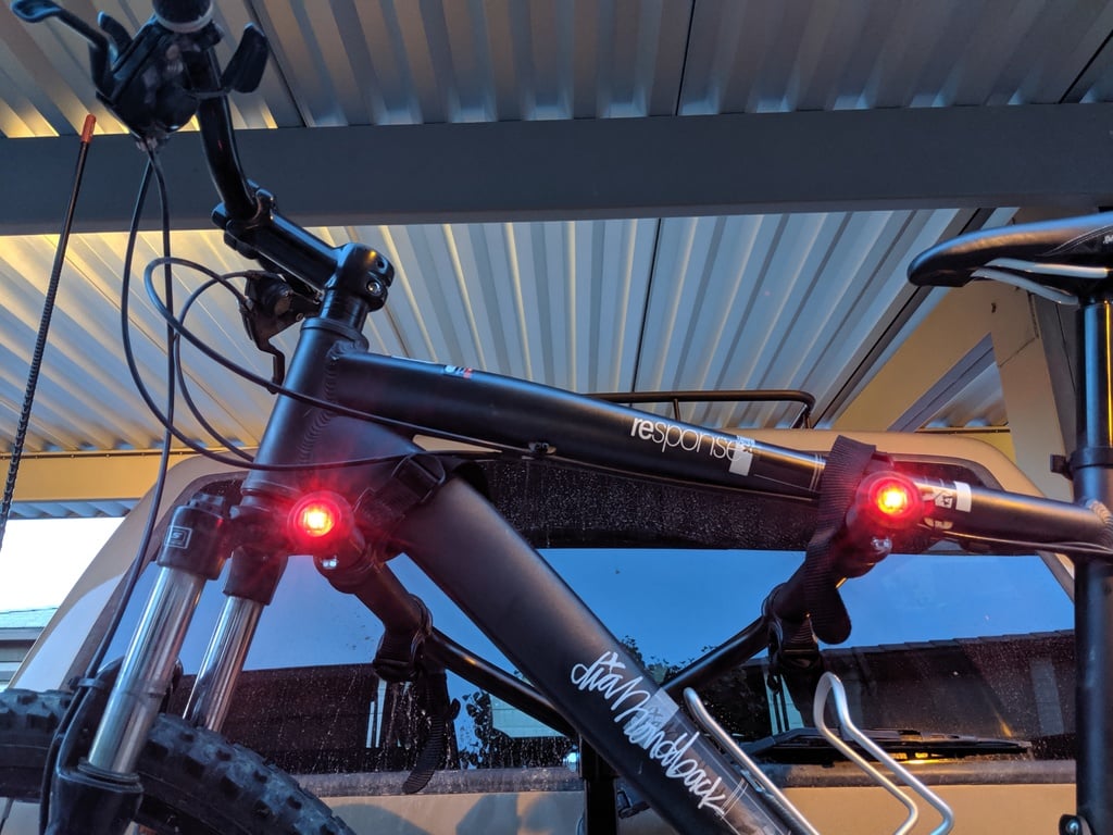 Bike rack brake light holders
