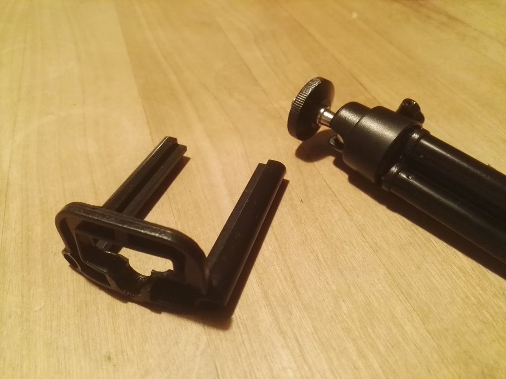 Replacement phone clamp for a mini camera tri-pod