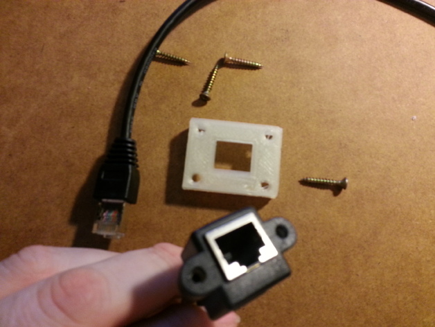 Plate for RJ45 LAN extension receptacle