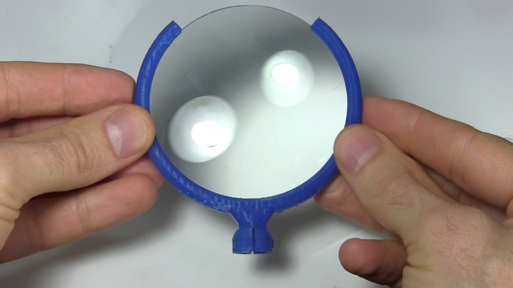 Magnifying glass holder with socket