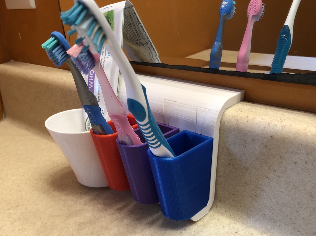 Backsplash toothbrush holder