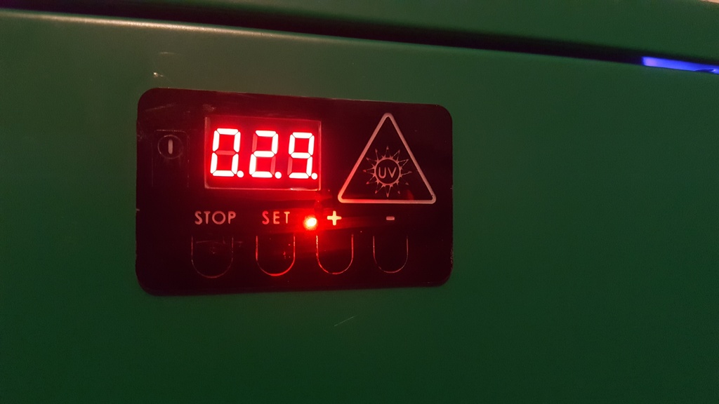Timer board cover for UV curing chamber