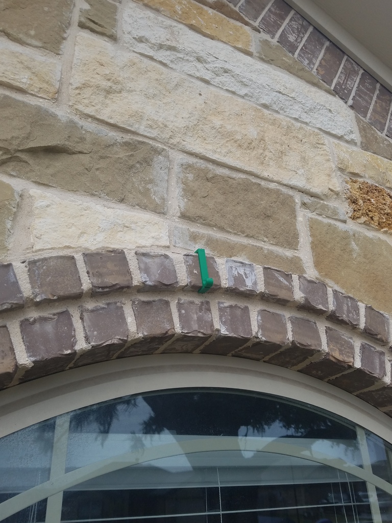 Christmas Light Holder for Brick window