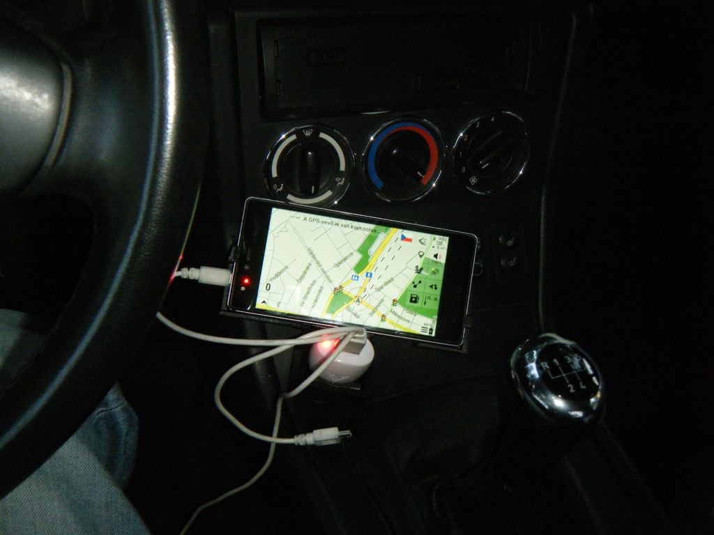 Phone holder on a car cigarette lighter