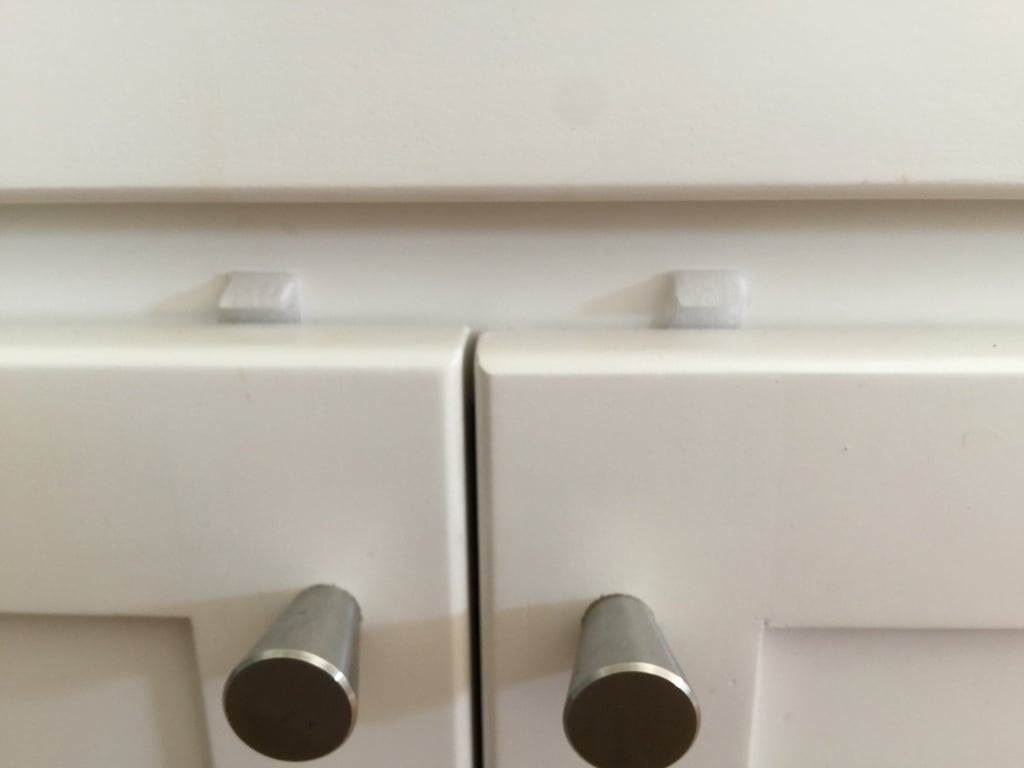 Pushbutton Child Safety Latch for Cabinets