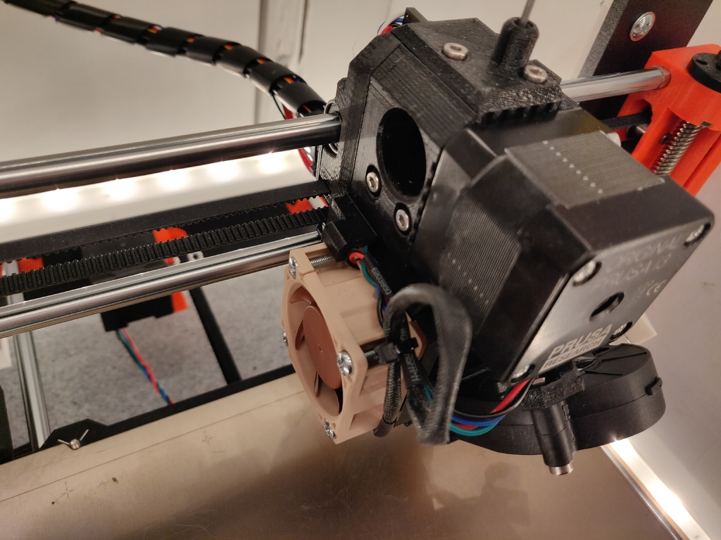 Based on Prusa MK3 R3 - updated Extruder with 40x40x20mm fan open Idler and improved airflow