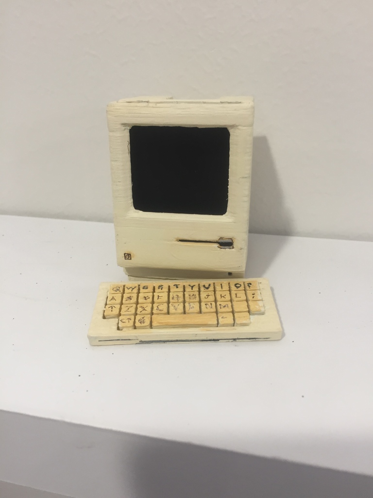 macintosh with keyboard and mouse