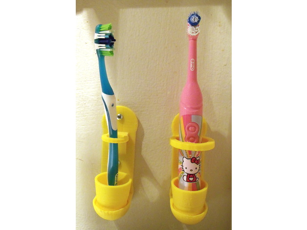 Wall mounted toothbrush holder with removable cup