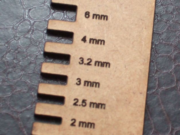 Sheet thickness gauge
