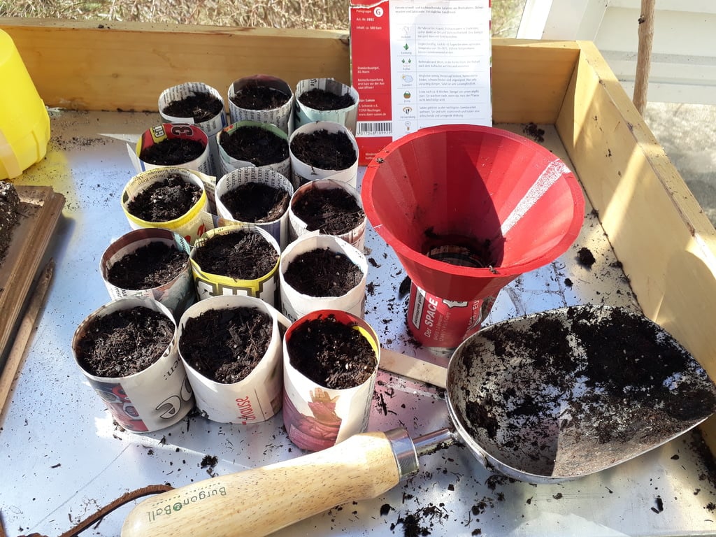 Gardener's soil funnel for paper pots and seed trays